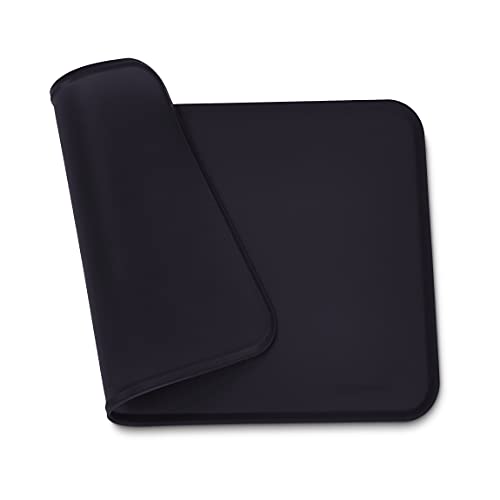 Amazon Basics - Alfombrilla para comedero de mascota, de silicona, impermeable, 47 x 29 cm, Negro
